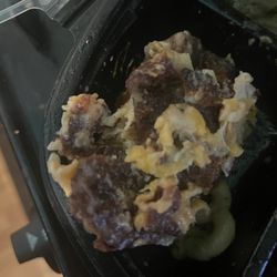 Omg Soul Eatery - Burned bottom of mac and cheese. It tasted okay after I removed the burned bottom from the portion.