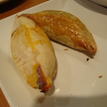 Empanada Mama - Hell's Kitchen - baked empanada (left) VS. fried empanada (right) - Latin American Near Me - New York, New York