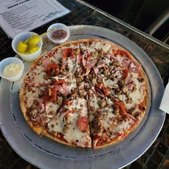 Neil's Grille and Bar - Meat lovers pizza - American Near Me - Memphis, Tennessee Neil's Grille and Bar - Meat lovers pizza - American Near Me - Memphis, Tennessee