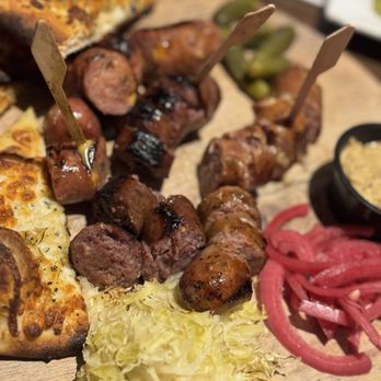 Wyoming Ale Works - The Bovine & Swine Sausage Board with burnt bread and no cheese. - Sports Bars Near Me - Casper, Wyoming