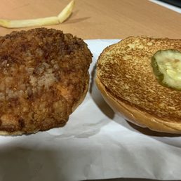 a chicken burger and a pickle sandwich a chicken burger and a pickle sandwich