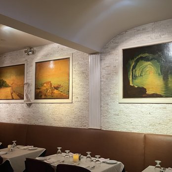 Mario's - a dining area with tables and chairs - Italian Near Me - Bronx, New York Mario's - a dining area with tables and chairs - Italian Near Me - Bronx, New York