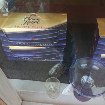 Main St Liquor Market - a man sitting in a window - Beer, Wine & Spirits Near Me - Point Pleasant, West Virginia Main St Liquor Market - a man sitting in a window - Beer, Wine & Spirits Near Me - Point Pleasant, West Virginia