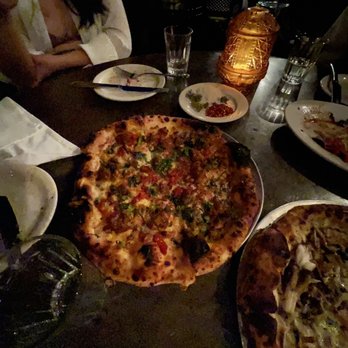 Gjelina - Lamb Sausage , Confi T Tomato , Rapini , Pecorino & Asiago Pizza - New American Near Me - Venice, California Gjelina - Lamb Sausage , Confi T Tomato , Rapini , Pecorino & Asiago Pizza - New American Near Me - Venice, California