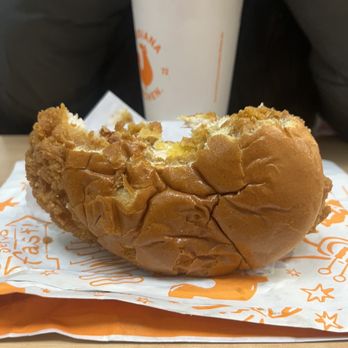 Popeyes Louisiana Kitchen - Half eaten sandwich - Chicken Wings Near Me - Howard Beach, New York Popeyes Louisiana Kitchen - Half eaten sandwich - Chicken Wings Near Me - Howard Beach, New York