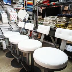 Rada Upholstery - Set of 4 barstools transformed with this white vinyl for a kitchen island.