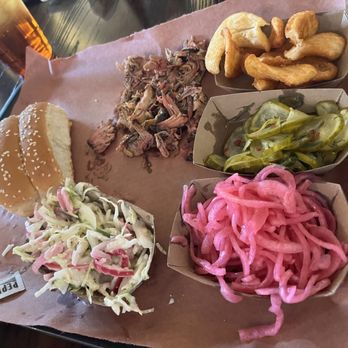Lewis Barbecue - Serving plate with half the pulled pork gone before picture. - Desserts Near Me - Atlanta, Georgia Lewis Barbecue - Serving plate with half the pulled pork gone before picture. - Desserts Near Me - Atlanta, Georgia