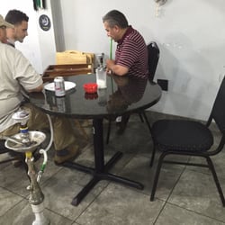 Tampa Hookah Lounge - Playing and smoke hookah