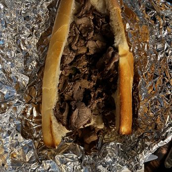 Deli & Brew - a roast beef sandwich wrapped in tin foil - Pizza Near Me - Troy, New York Deli & Brew - a roast beef sandwich wrapped in tin foil - Pizza Near Me - Troy, New York