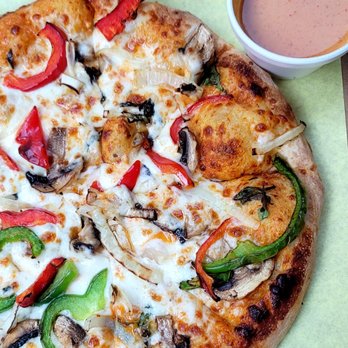 Thai Curry Pizza - Curry Pizza with mushrooms instead of chicken and a side of curry dipping sauce - Pizza Near Me - Long Beach, California Thai Curry Pizza - Curry Pizza with mushrooms instead of chicken and a side of curry dipping sauce - Pizza Near Me - Long Beach, California