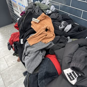 Spin Cycle Lavanderia - These are all the clothes they threw on the ground so now I have to wash them again - Laundromat Near Me - Reno, Nevada