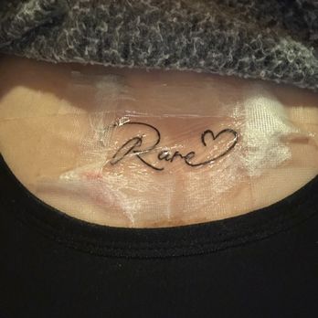 Tattoo Vibes - Small word on chest (rare) - Tattoo Near Me - Bronx, New York Tattoo Vibes - Small word on chest (rare) - Tattoo Near Me - Bronx, New York