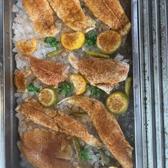 Seafood Paradise - a pan of fish and rice - Seafood Near Me - Chicago, Illinois Seafood Paradise - a pan of fish and rice - Seafood Near Me - Chicago, Illinois