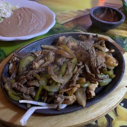 Steak shrimp and chicken fajitas Steak shrimp and chicken fajitas