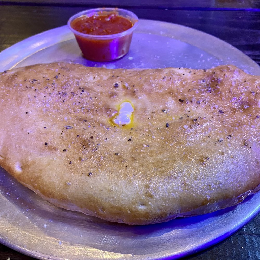 Florence Beer Market - Pepperoni Calzone - Beer Gardens Near Me - Florence, Texas Florence Beer Market - Pepperoni Calzone - Beer Gardens Near Me - Florence, Texas