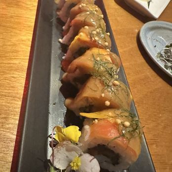 Tane Vegan Izakaya - Kailua roll with some gyoza peeking out in the back! - Sushi Bars Near Me - Honolulu, Hawaii