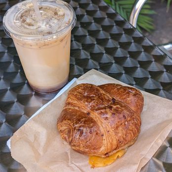 GTA Coffee - A Lavender Honey Oat Milk Latte and Ham and Cheese Croissant - Coffee & Tea Near Me - Long Beach, California GTA Coffee - A Lavender Honey Oat Milk Latte and Ham and Cheese Croissant - Coffee & Tea Near Me - Long Beach, California