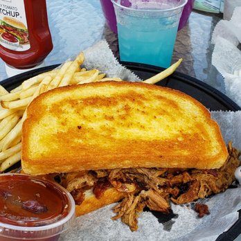 Mulligans Sports Bar & Grill - Pulled pork sandwich. - Sports Bars Near Me - Mountain, Wisconsin Mulligans Sports Bar & Grill - Pulled pork sandwich. - Sports Bars Near Me - Mountain, Wisconsin