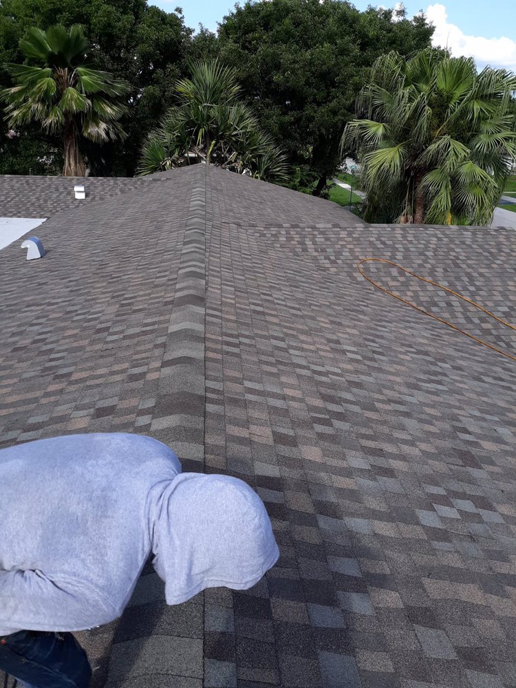 Slide of Alex Roofing