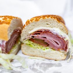 Sandwich Mill Deli & Catering - Italian Submarine:
Mortadella, Cotto, Salami, Capícola & Provolone Cheese on Dutch Crunch ($14/LG)