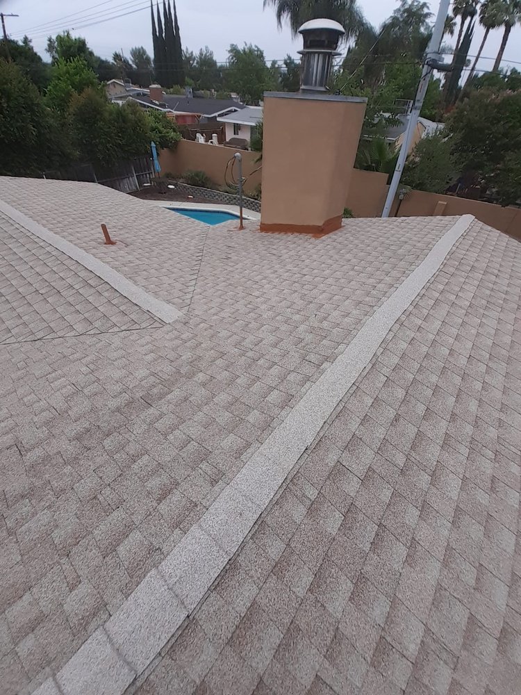 Slide of TopCal Roofing