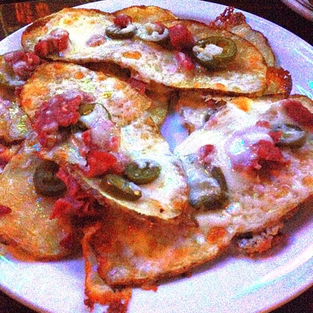 Keneally’s Irish Pub - Super charged with calories - Irish Nachos, pub style. - Pizza Near Me - Houston, Texas Keneally’s Irish Pub - Super charged with calories - Irish Nachos, pub style. - Pizza Near Me - Houston, Texas
