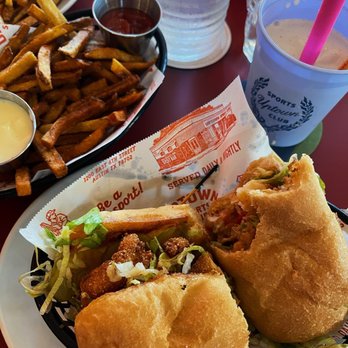 Uptown - Shrimp po boy & fries - Sports Bars Near Me - Austin, Texas Uptown - Shrimp po boy & fries - Sports Bars Near Me - Austin, Texas