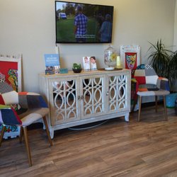 Zaihly Azar, DDS - Beautiful Smiles Dental - Comfortable lobby with water, coffee, and comfortable seating that is also big person friendly.