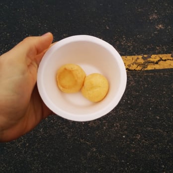 Strada By Luciano's - a person holding a bowl of food - Food Trucks Near Me - Mulvane, Kansas