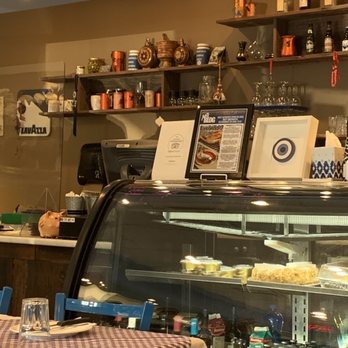 Christinas Cuisine - a display case with a variety of food items - Greek Near Me - Laval, Quebec