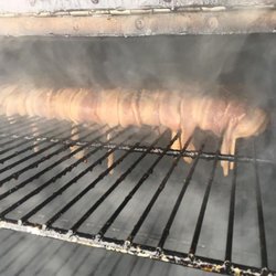 Wyoming Buckshot Saloon - Our in house smoker doing the work! This is a bacon-wrapped pork loin!