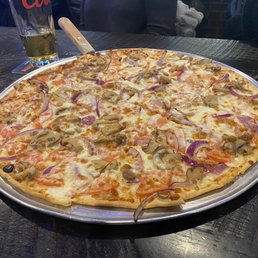 a pizza on a table a pizza on a table