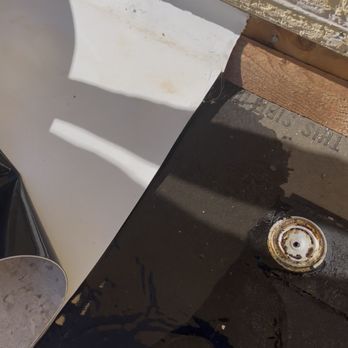 Century Roofing Specialists - Big puddles of water found when roofing material was pulled up - Roofing Near Me - Sanford, Florida
