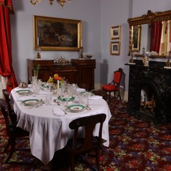 The Boyhood Home of President Woodrow Wilson - The Wilsons' dining room, where young Tommy carved his mark into the table.