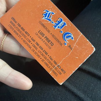 LPC - a person's hand holding a business card - General Contractors Near Me - Hesperia, California LPC - a person's hand holding a business card - General Contractors Near Me - Hesperia, California