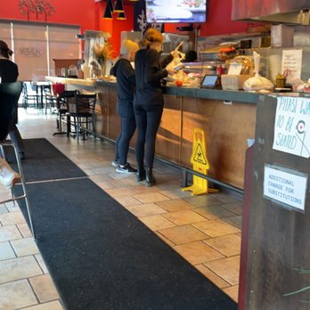 SushiNati - a man and a woman in a restaurant - Sushi Bars Near Me - Cincinnati, Ohio SushiNati - a man and a woman in a restaurant - Sushi Bars Near Me - Cincinnati, Ohio