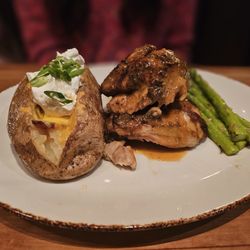 Classic Rotisserie Chicken with loaded baked potatoes