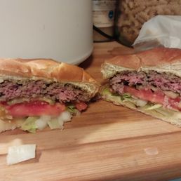 Andy's pizza & Subs  13280 Northline Rd. Southgate, Michigan 48195 734-281-2920 I bought 2 regular burgers this one raw in the middle.