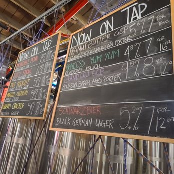 The Mighty - a chalk board with a list of beers - Burgers Near Me - Arvada, Colorado The Mighty - a chalk board with a list of beers - Burgers Near Me - Arvada, Colorado
