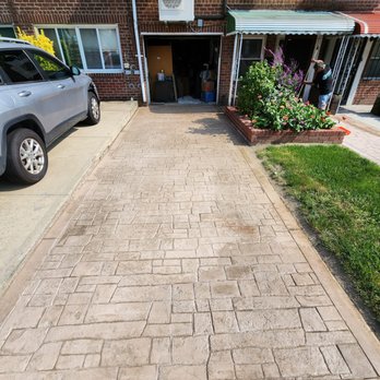 Cement Tech - a driveway with a car parked in front of it - Masonry/Concrete Near Me - long island city, New York