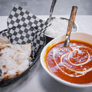 Utsav - a bowl of tomato soup and a bowl of rice - Food Delivery Services Near Me - Toronto, Ontario