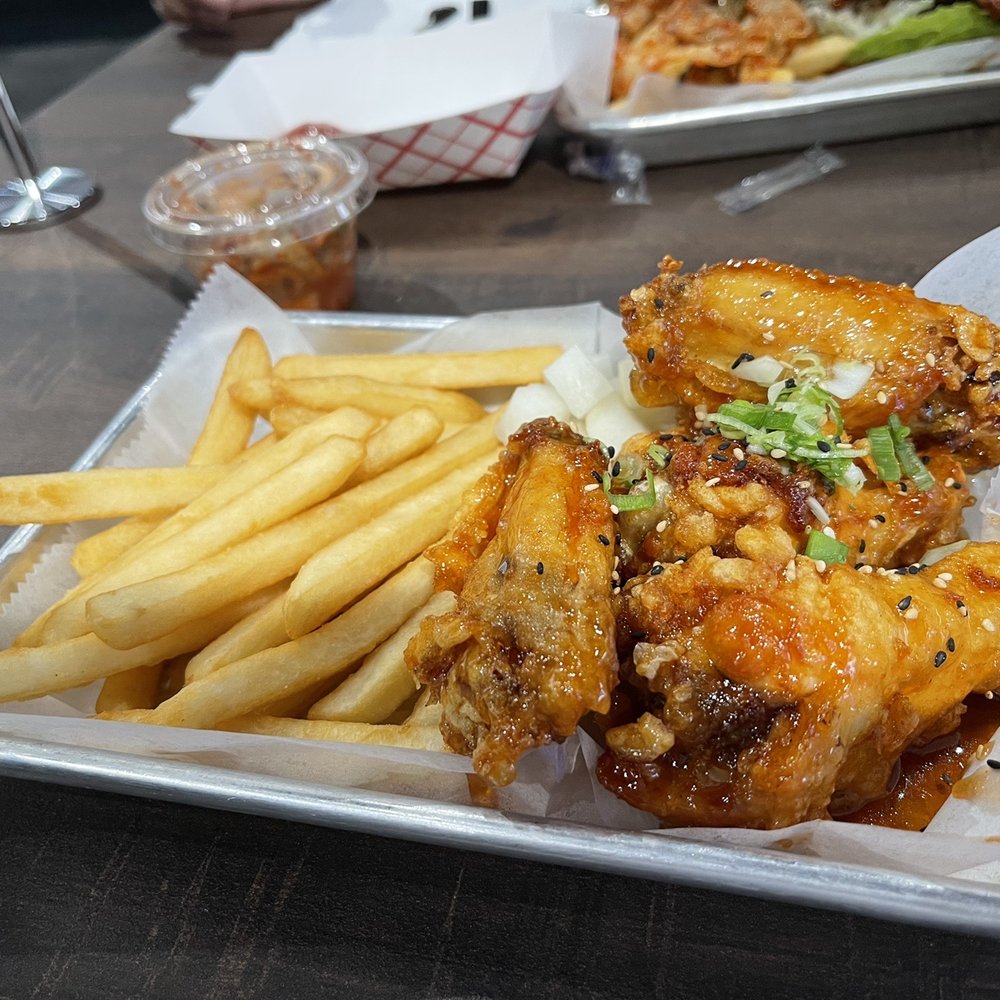 So-Ju Chikn' - Wings in Honey Sriracha Sauce - Korean Near Me - Melbourne, Florida So-Ju Chikn' - Wings in Honey Sriracha Sauce - Korean Near Me - Melbourne, Florida