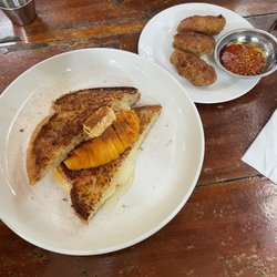 Lazy Dog Bed And Breakfast - Cheesy French toast and a side of local sausages