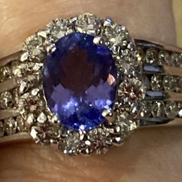 Tanzanite and Diamond 18k ring. Tanzanite and Diamond 18k ring.