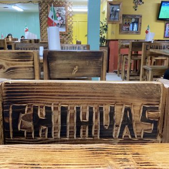 Tako Chihuas - a table and chairs in a restaurant - Mexican Near Me - Fort Worth, Texas Tako Chihuas - a table and chairs in a restaurant - Mexican Near Me - Fort Worth, Texas