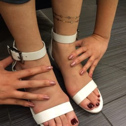 My mani/pedi: Sparkly pink- OPI? for hands, and crimson red- Essie? for feet. Jane even gave me a free flash tattoo for being a new customer