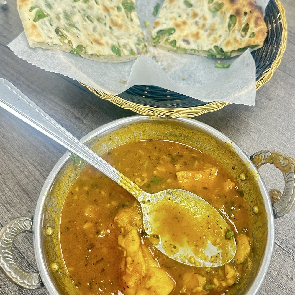 Chicken curry and Bullet Naan. Chicken curry and Bullet Naan.