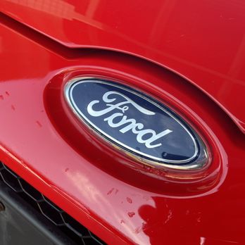 Carvana Tempe - Tape and paint bubbling under the Ford emblem from being re-painted - Car Dealers Near Me - Tempe, Arizona Carvana Tempe - Tape and paint bubbling under the Ford emblem from being re-painted - Car Dealers Near Me - Tempe, Arizona