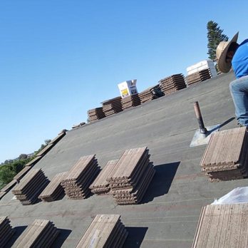 Coast Remodeling Services - Placing new underlayment. - Roofing Near Me - San Diego, California Coast Remodeling Services - Placing new underlayment. - Roofing Near Me - San Diego, California
