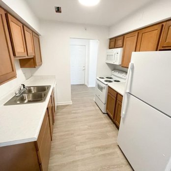 J C Beal Construction - a kitchen with white appliances - General Contractors Near Me - Detroit, Michigan